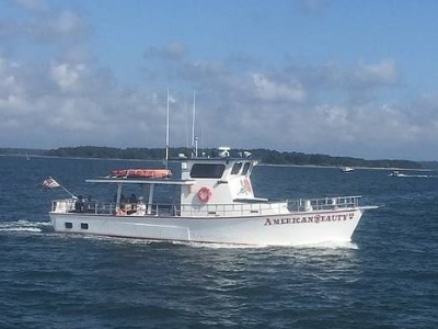 American Beauty II cruising on Shelter Island sound with a private boat charter on a beautiful afternoon