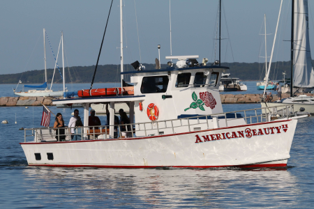 American Beauty II leavng Sag Harbor Bay with a small private charter
