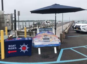 The ticket stand for AMerican Beauty Cruises & Charters on Long Wharf in Sag Harbor, NY.